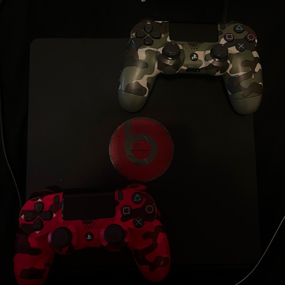 PS4 w/ two brand new camouflage controllers